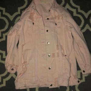 Oversized distressed pink denim jacket